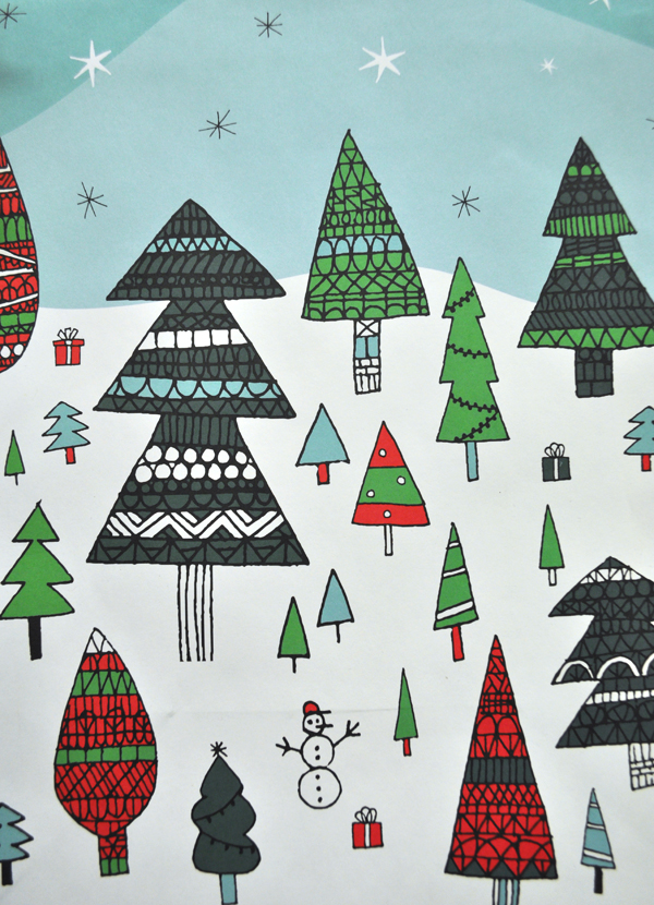Image of Holiday Wrapping Paper with Christmas trees on a hill covered in snow