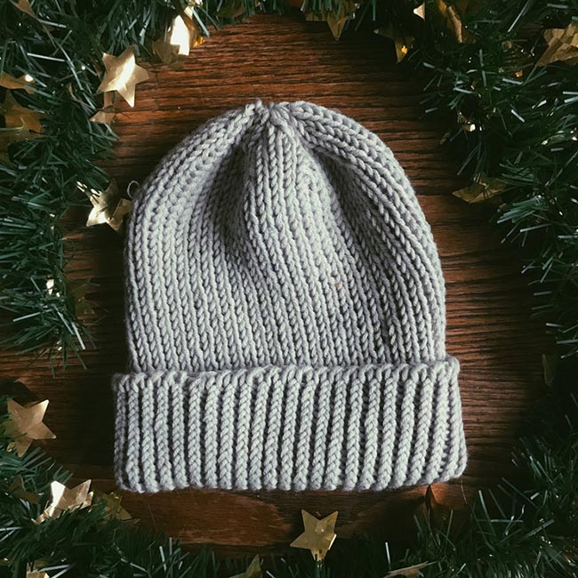 Image of a beanie made out of sustainable yarn, a perfect eco-friendly gift for the holidays