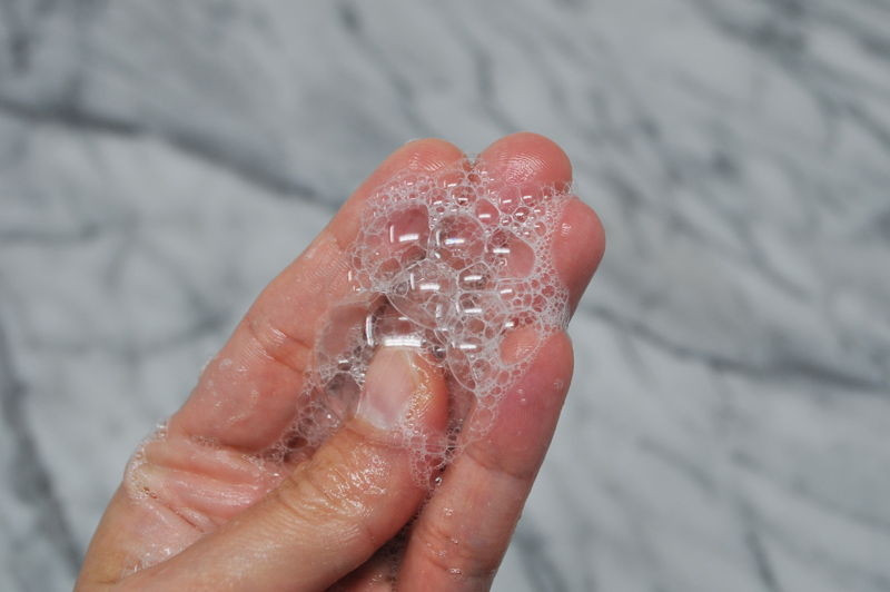 Image of a hand with bubbles on it. 